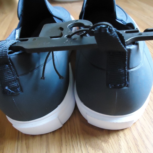 SIZE 10. Men’s water, garden slip one shoes.